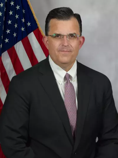 picture of Paul Diaz with an american flag background