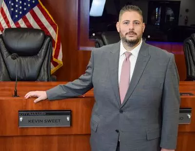 Kevin Sweet-City Manager standing at the dais