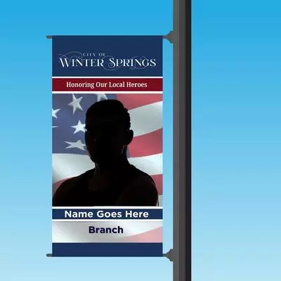 a pole with a banner design showing the city of winter springs on a blue background with a silhouette over an American flag background